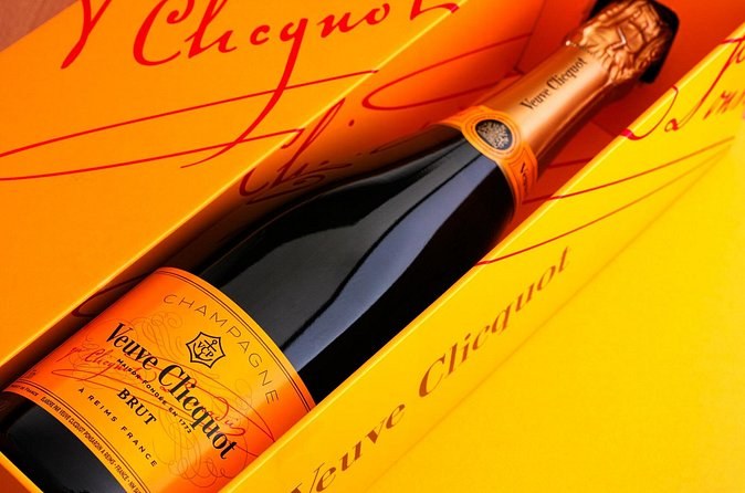 A bottle of Veuve Clicquot Brut Yellow Label lying in its yellow box